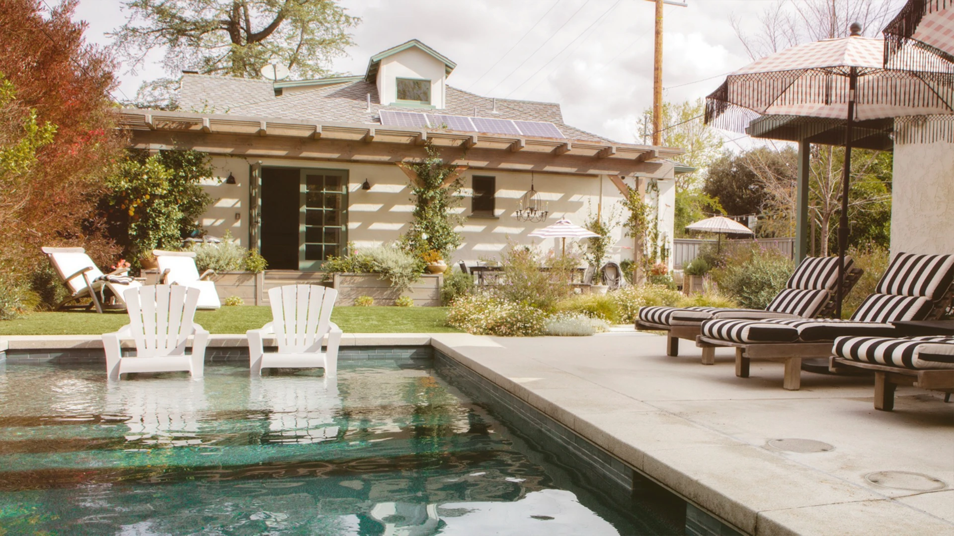 Outdoor pool and patio area transformed by expert interior and exterior designing services in Dubai