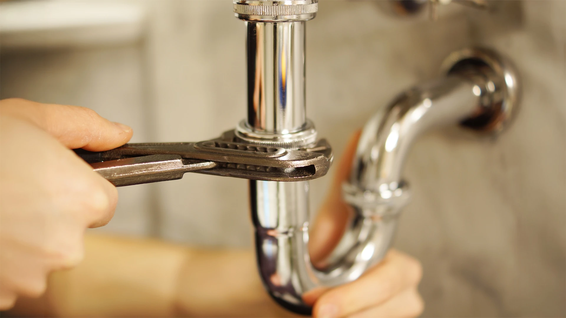 Close-up of leaking faucet highlighting plumbing services in Dubai for tap repairs.