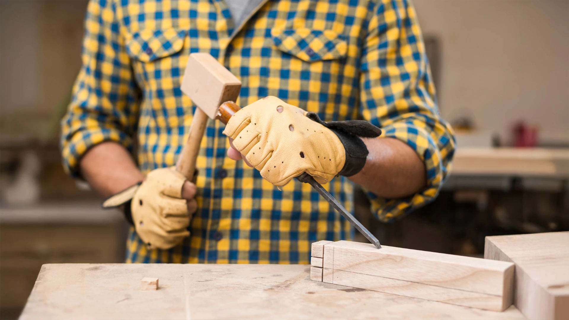 Carpenter working on woodwork improvements for home repair services in Dubai.